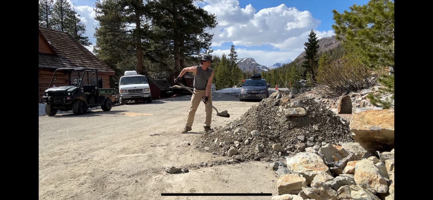 Adrian shoveling